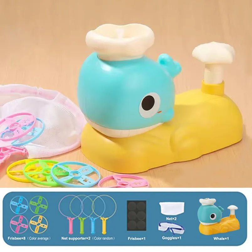 Colorful toy whale with accessories