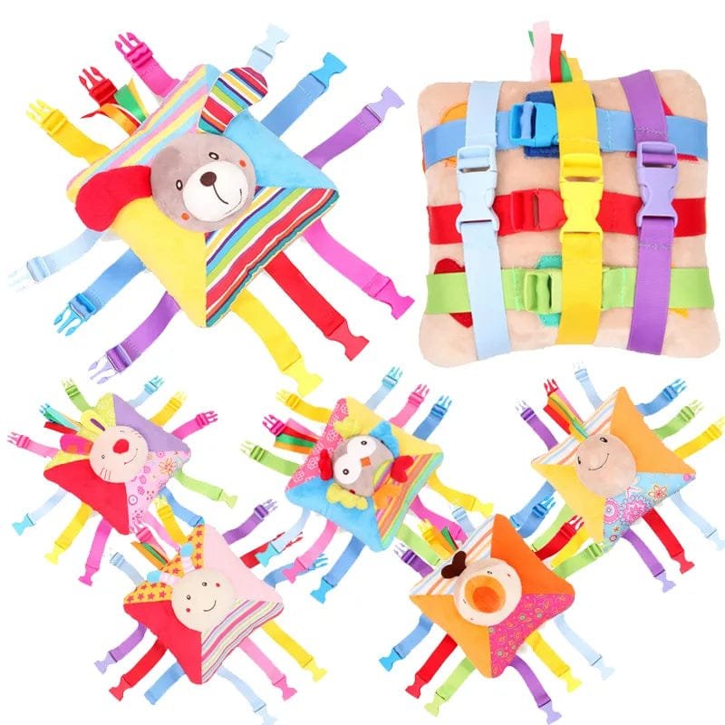 Colorful baby toys with various shapes and patterns on a white background