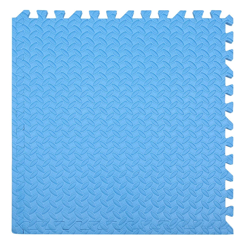 Blue interlocking foam mat with textured pattern