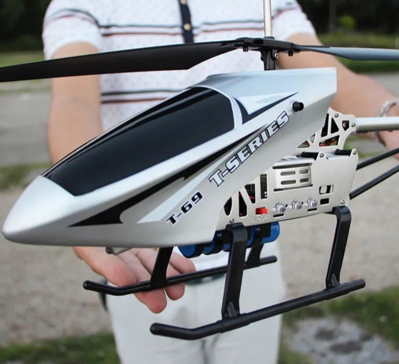 A model helicopter held by a person