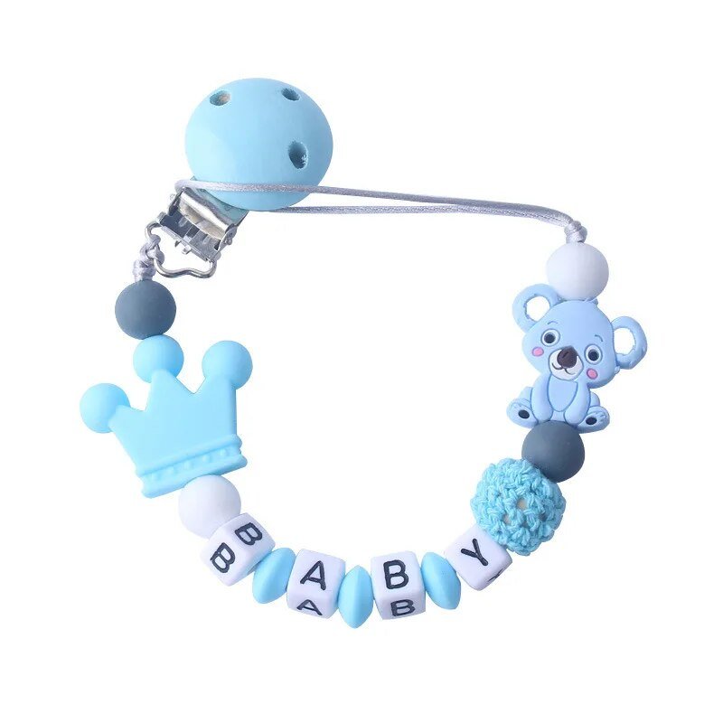Baby teething toy with blue and gray elements on a white background