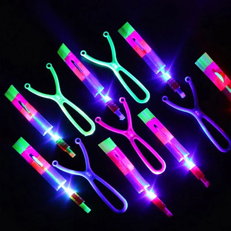 Set of colorful LED slingshots on a dark background