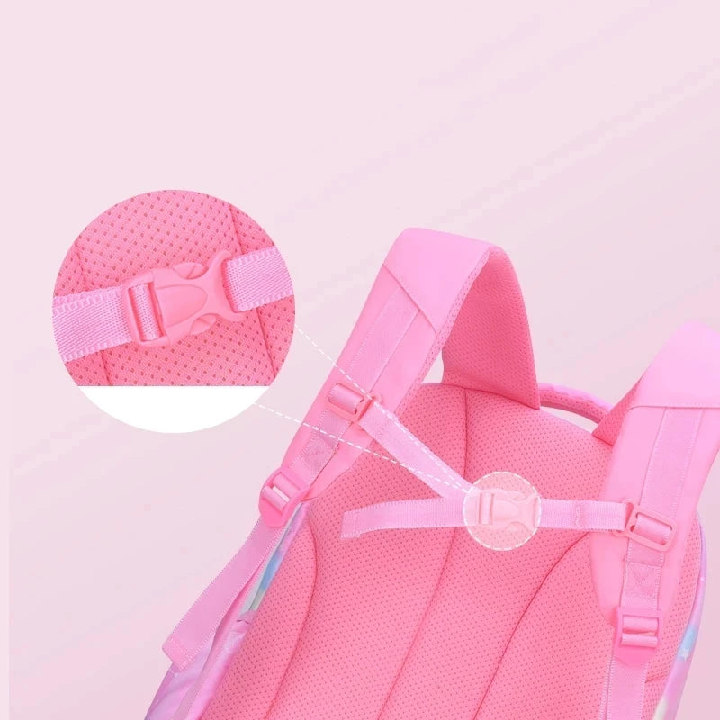 Close-up of a pink backpack with a focus on the straps and mesh padding.