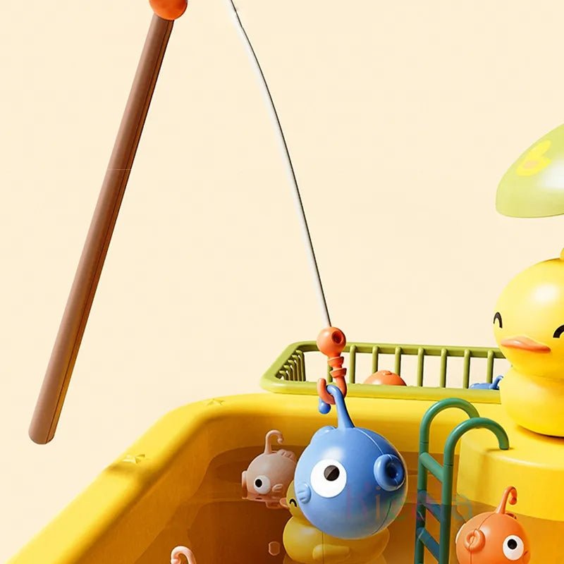 Yellow rubber duck with fishing rod and small toy fish.