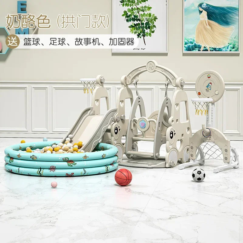 Children's play area with a slide, ball pit, and sports equipment on a marble floor.