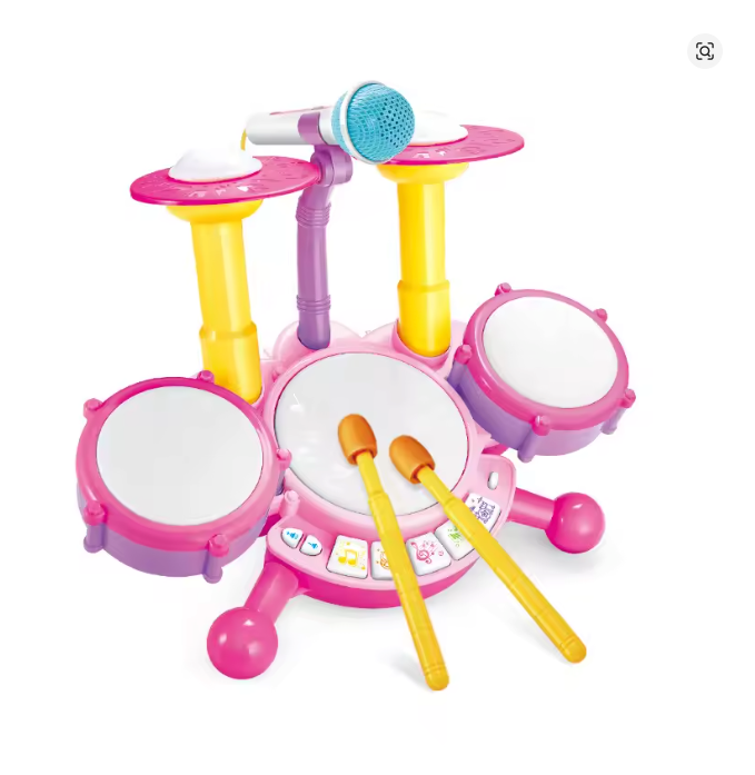Pink toy drum set with microphone.