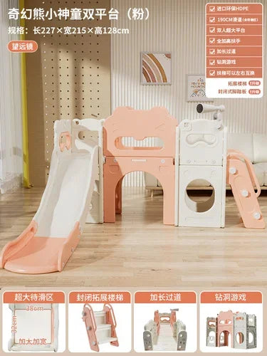 Children's playset with slide and climbing structure on a wooden floor.