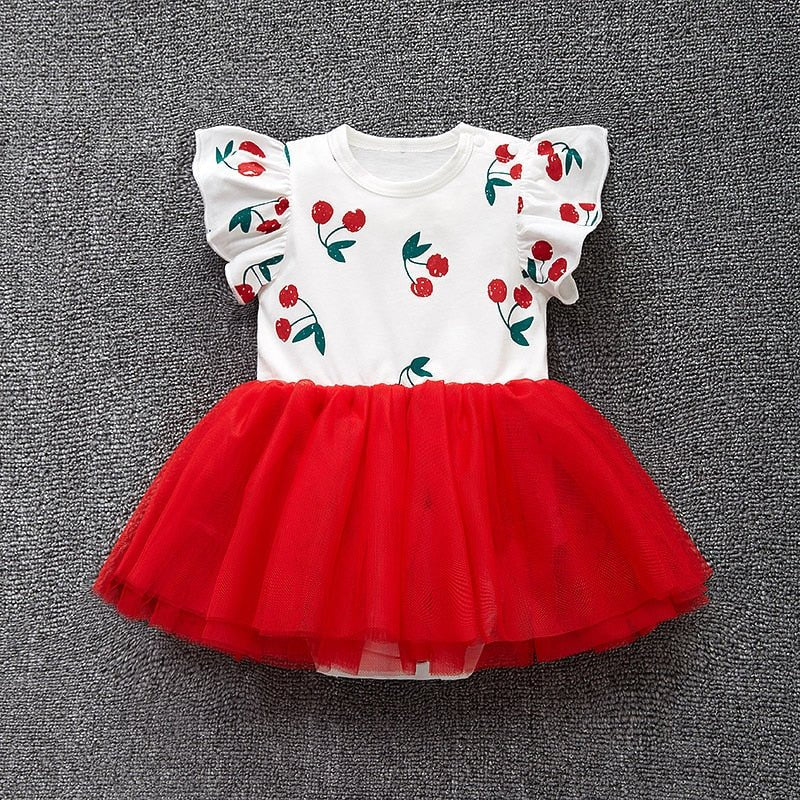 White dress with red cherry embroidery and red tutu skirt