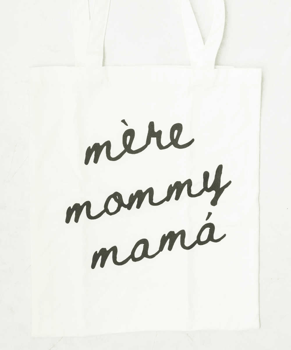 White tote with 'mère mommy mamá' text.