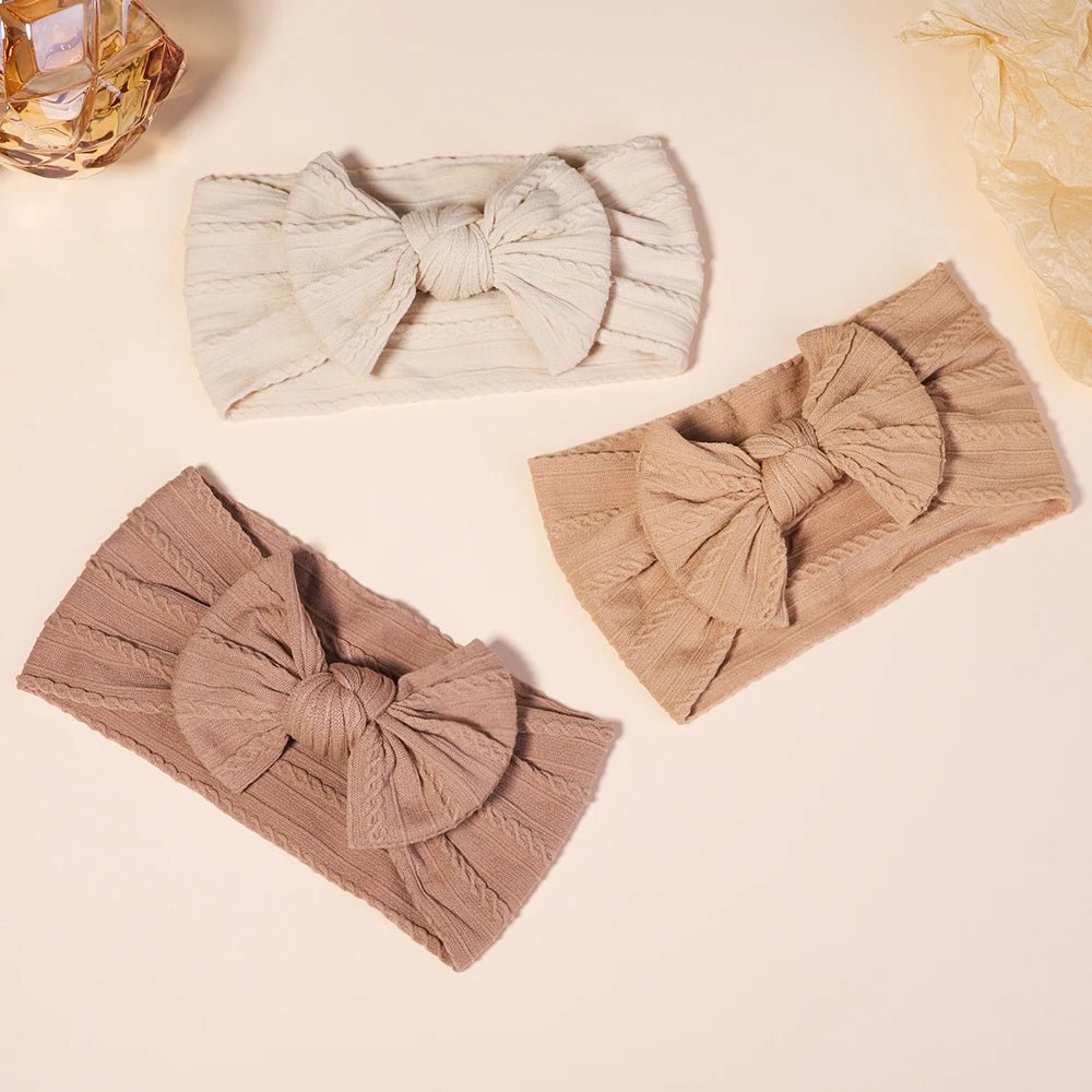 Three headbands with large bows