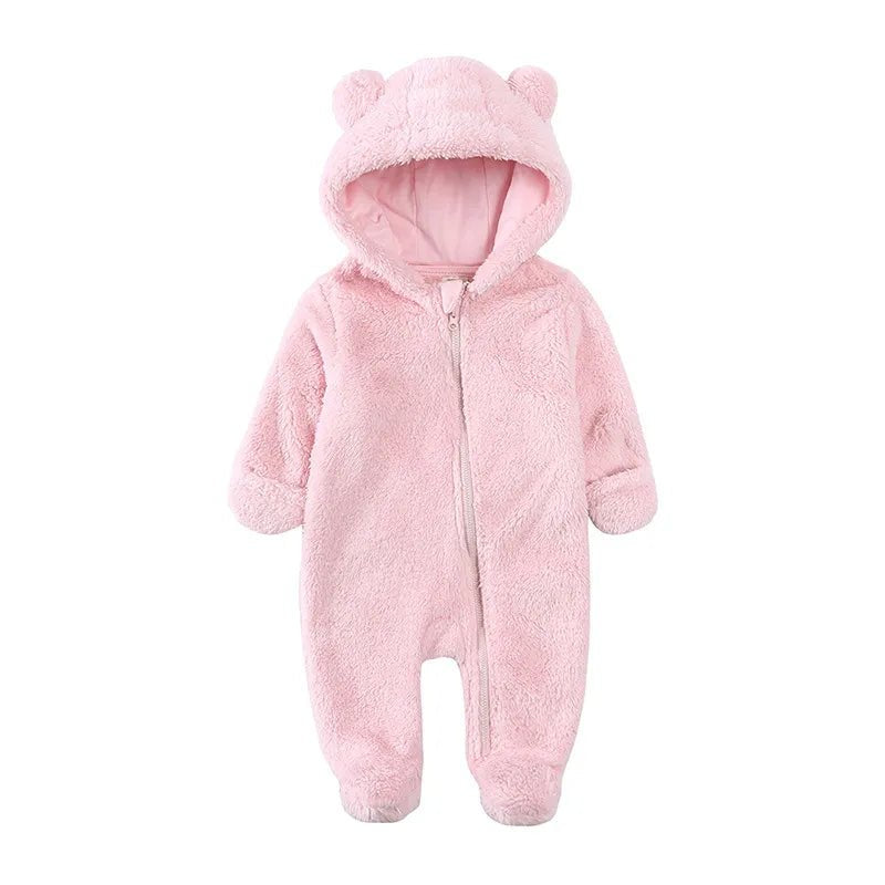 Pink baby snowsuit with bear ears.