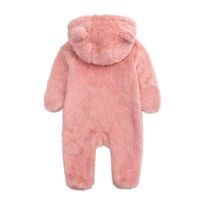 Pink fluffy baby onesie with bear ears and a tail