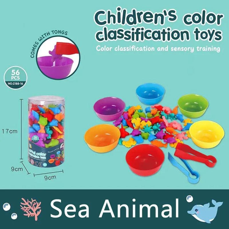 Children's color classification toys with bowls and tongs on a teal background