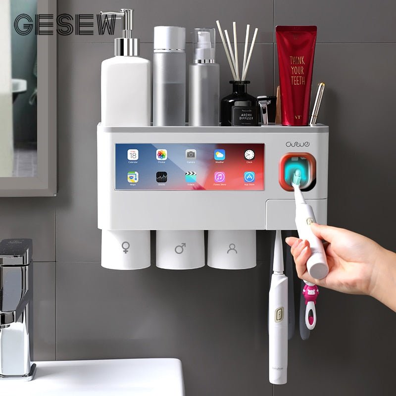 Bathroom shelf with multiple compartments, a digital display, and a hand holding a toothbrush.