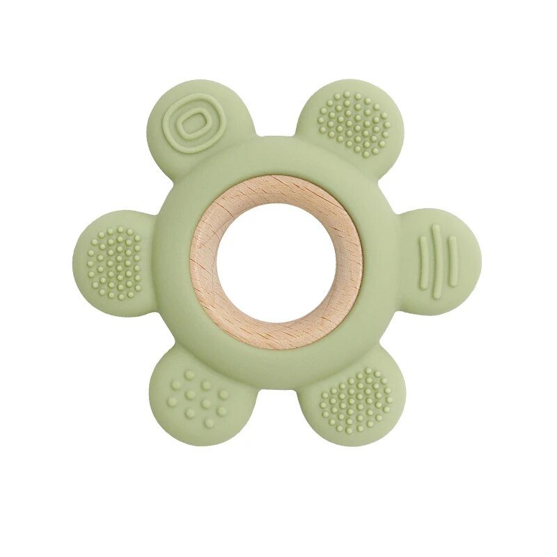 Green teething ring with wooden center.