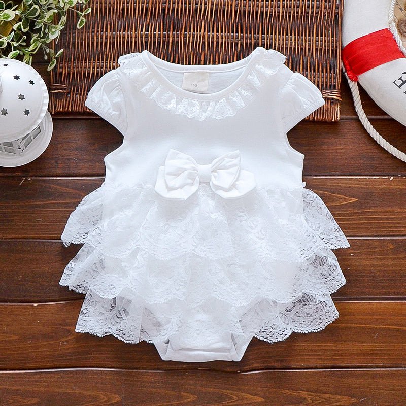 White baby dress with lace details