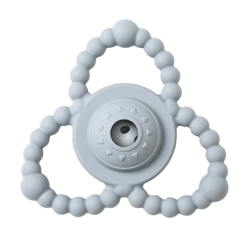 Gray teething ring with beads.