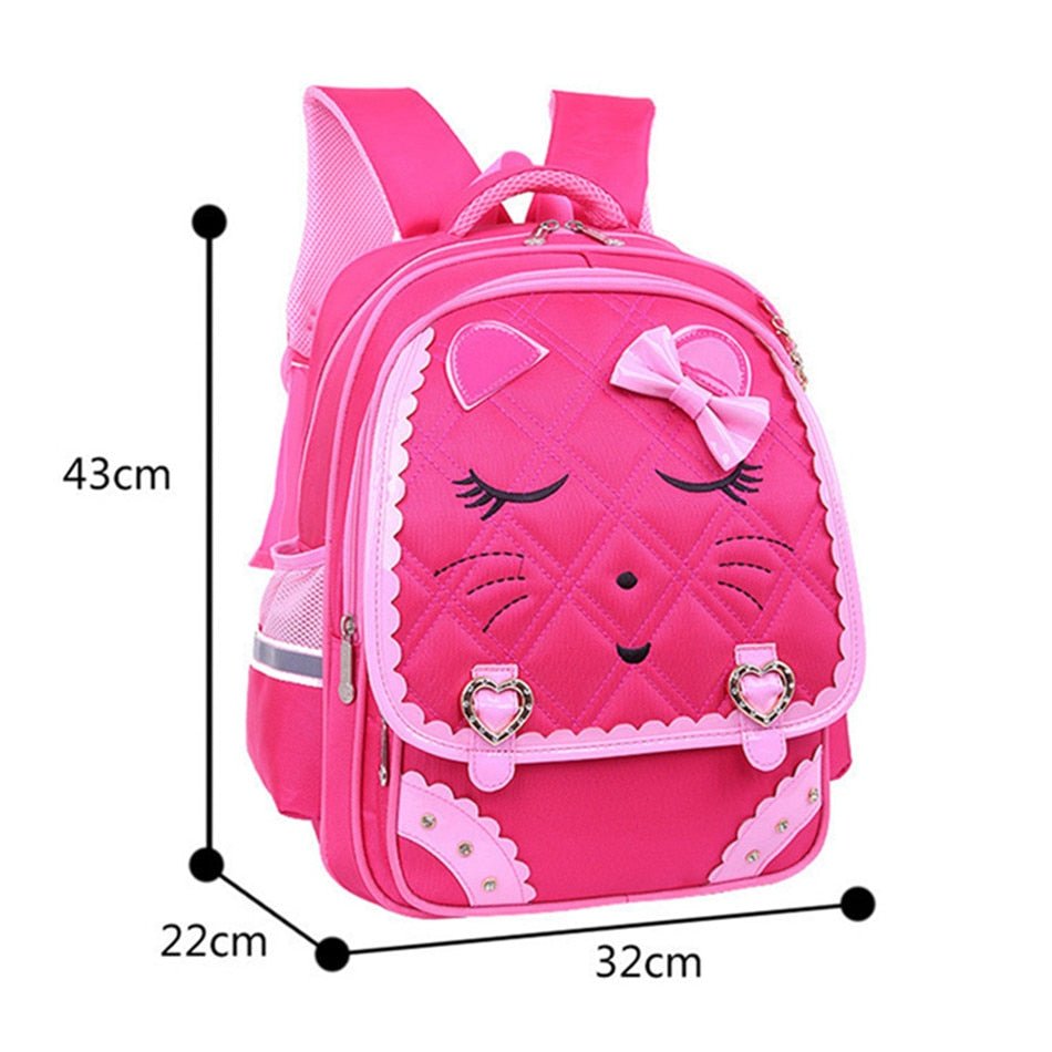 Pink backpack with cartoon face design and measurements