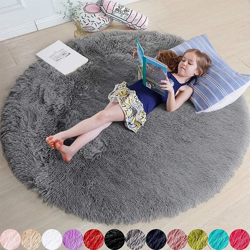 Child reading a book on a large gray fluffy rug with color swatches below.