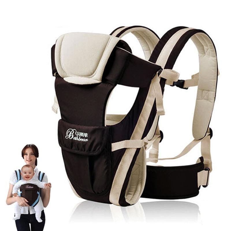 Black and beige baby carrier with a woman holding a baby.