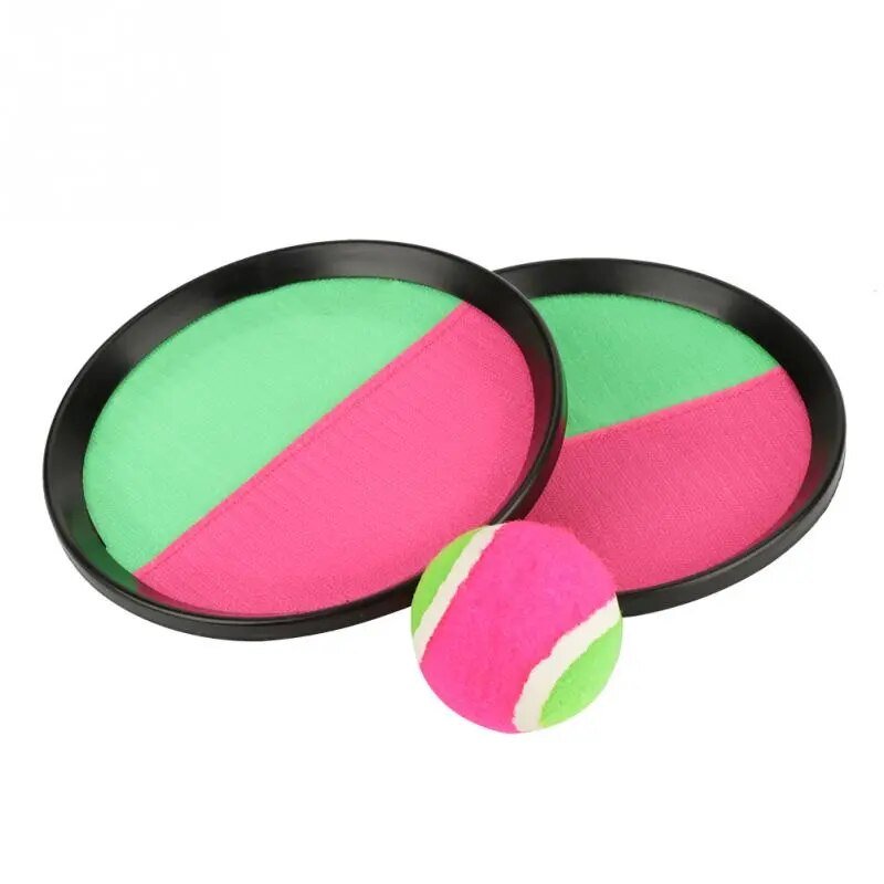 Two pink and green juggling rings with a matching ball on a white background