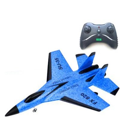 Blue toy airplane with a remote control on a white background