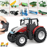 Toy tractor with remote control and detachable farming implements on a white background