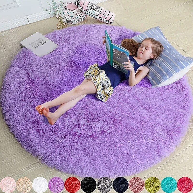 Child lying on a large purple round rug reading a book, with color swatches at the bottom.