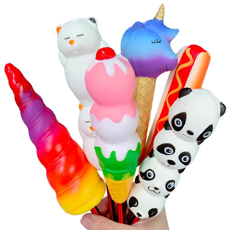 Collection of colorful novelty items including a unicorn, ice cream cone, and panda design on a white background.