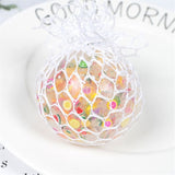 Colorful gummy bear treat in a clear mesh bag with 'Good Morning' text in the background.