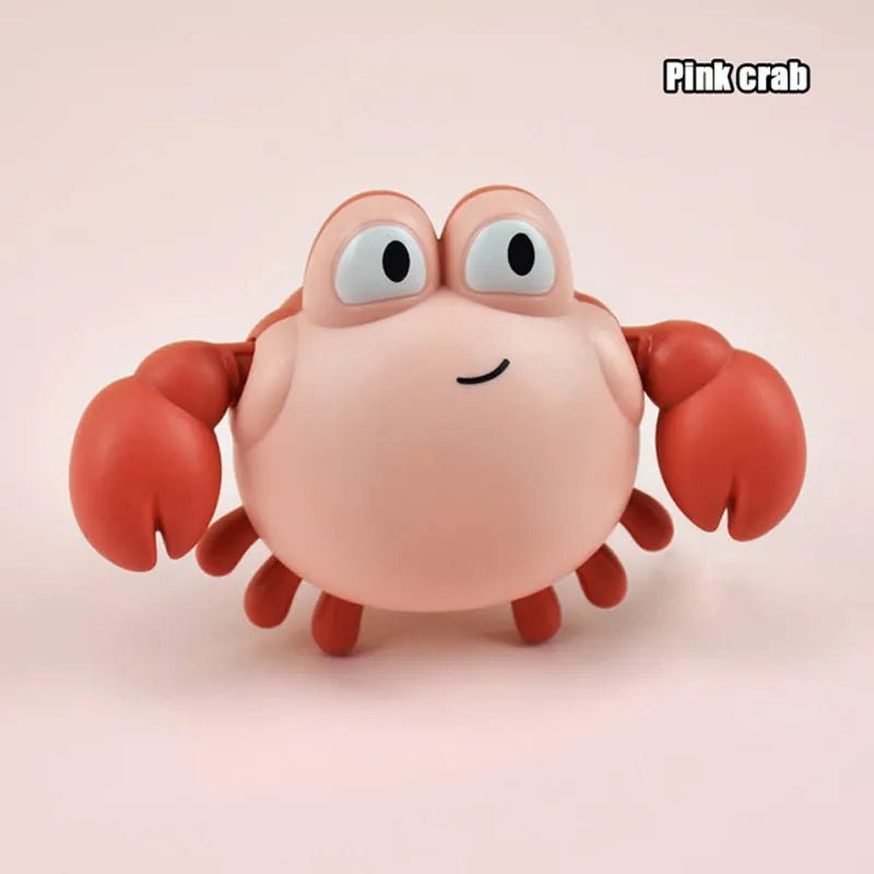Pink crab toy with large eyes on a beige background
