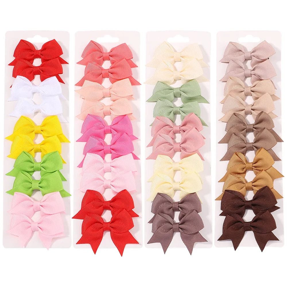 Collection of colorful hair bows in various colors.