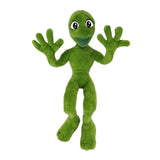 Green plush toy with a smiling face on a white background