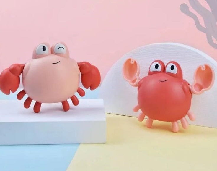 Two cartoon crab toys on a colorful background