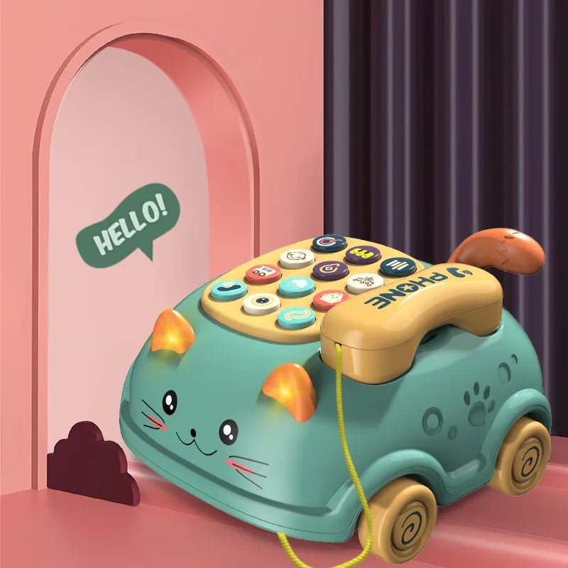 Toy phone shaped like a car with a pink arch and purple curtain in the background