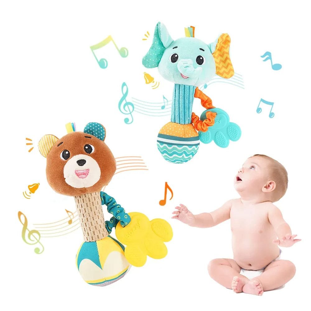 Two colorful baby toys with musical notes and a baby reaching out to them on a white background.