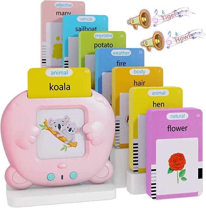 Pink educational toy with flashcards displaying words and pictures on a white background