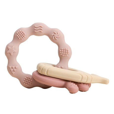 Pink silicone teething ring with wooden handle on a white background
