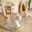 White rocking horse toy in a child's playroom.