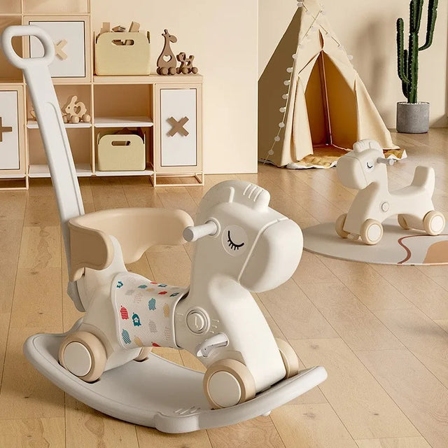 White rocking horse toy in a child's playroom.