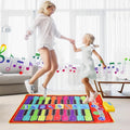 20-key kids piano mat with duet keyboard being played by a parent and child for shared music time at home.