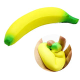 Banana-shaped stress reliever toy on a white background