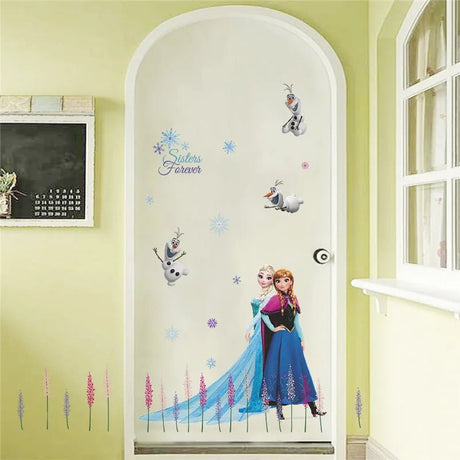Decorative wall stickers of a princess and Olaf on a door with 'Sisters Forever' text.