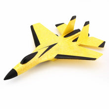 Yellow and black electric RC glider airplane with fixed wing body for beginner flight training and outdoor fun.