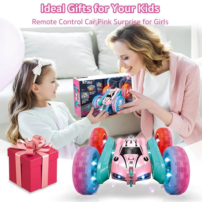 Pink off-road RC stunt car with big wheels being enjoyed by a parent and child as a birthday gift toy.