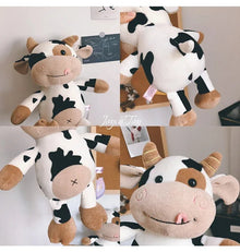 Multi-angle view of the kids milk cow plush toy showing the stuffed cattle design for display and play.