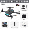 Black dual 4K drone with accessories, remote control, battery, and manual on a white background.