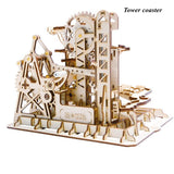 Wooden mechanical model of a tower coaster with ROKR branding on a white background
