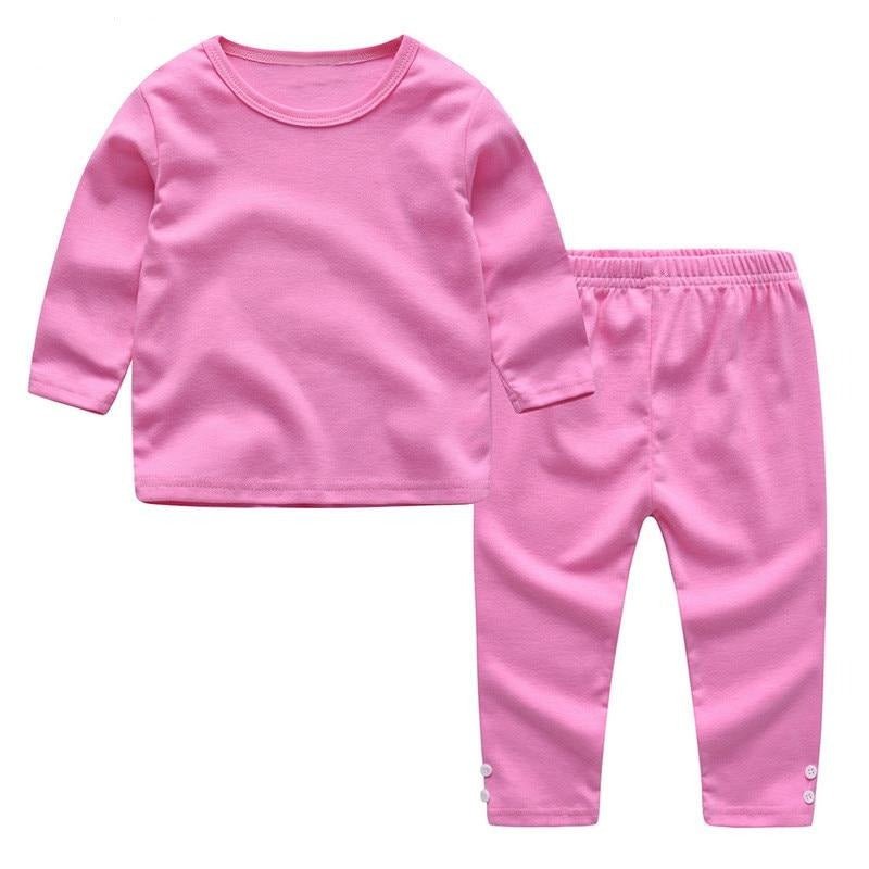 Pink children's long-sleeve shirt and pants set 