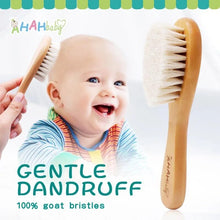 Close view of the baby hair brush soft bristles, shaped for gentle scalp massage during bath time routines.